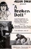 A Broken Doll